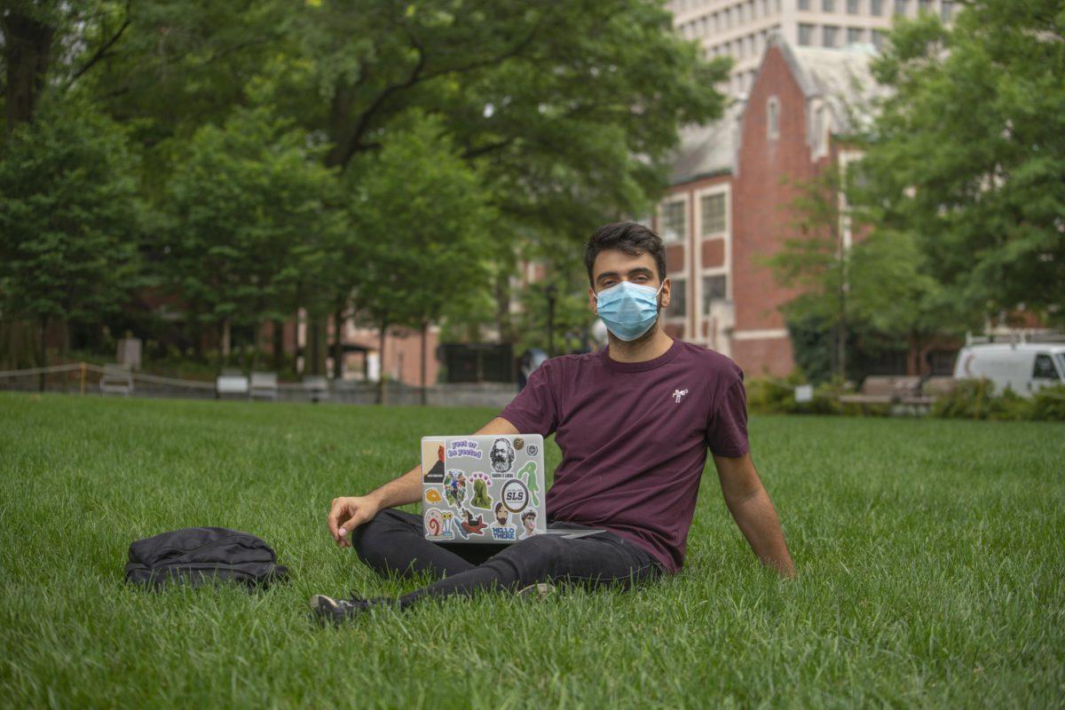 A student wearing protective face covering, photo