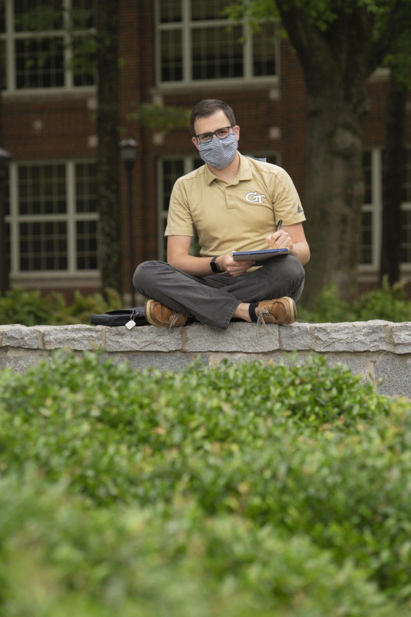 A student wearing PPE, photo