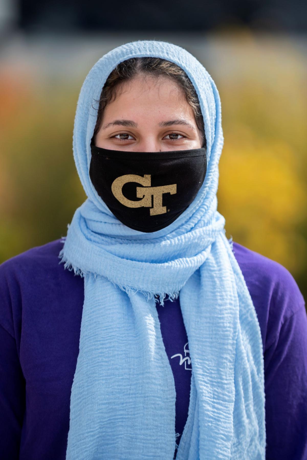 A staff member masked.