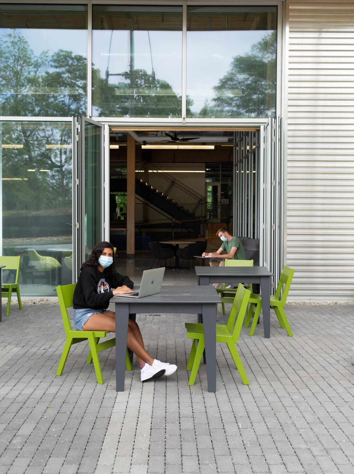 Students socially distant at outside seating